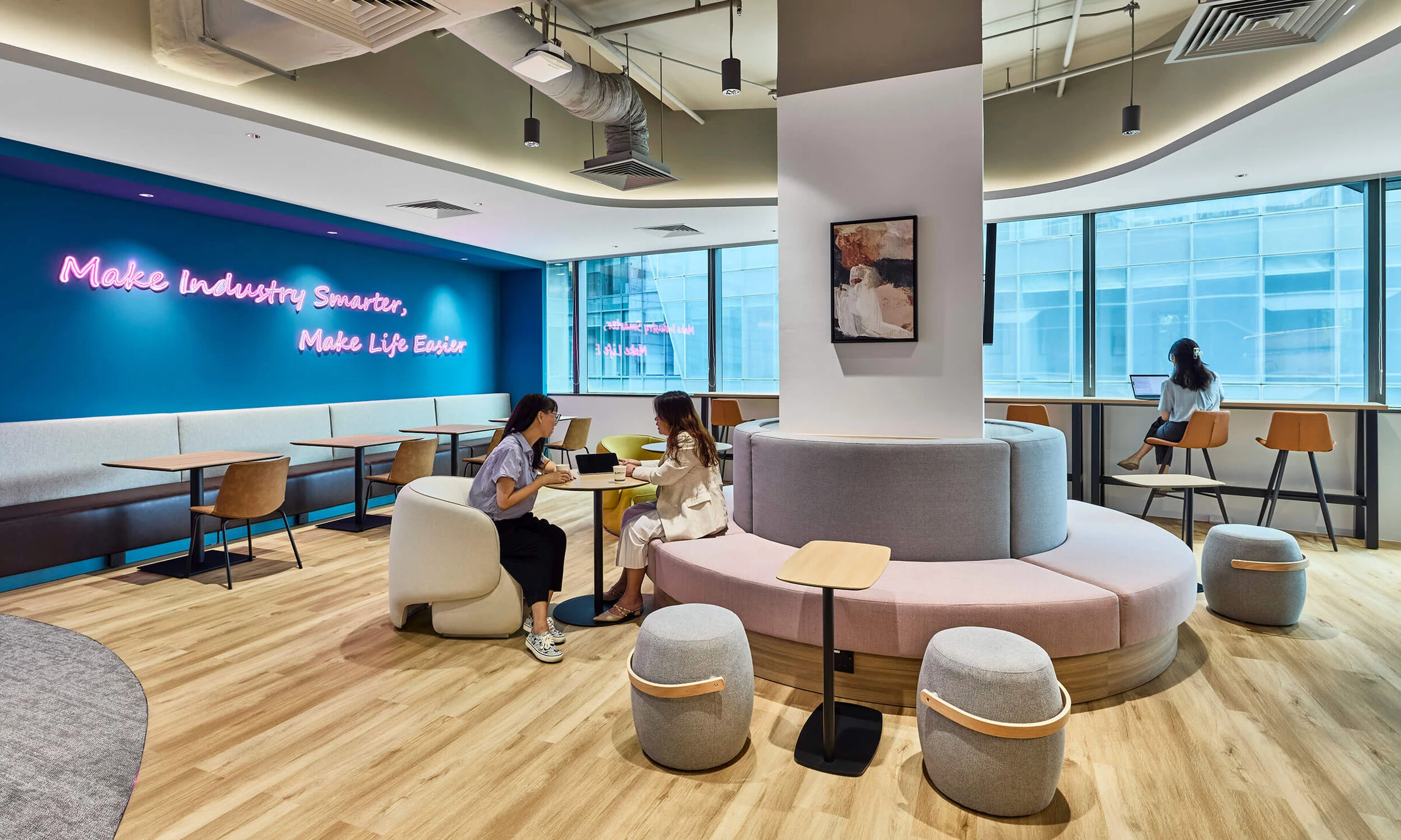Comfortable meeting area with employees